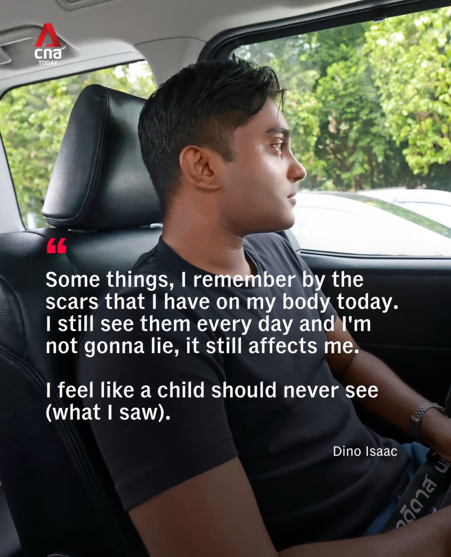 Dino Isaac looking out of a car window