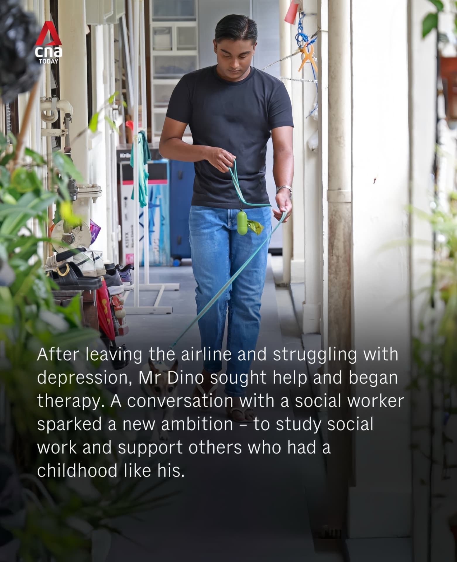 Dino Isaac walking his dog along a corridor